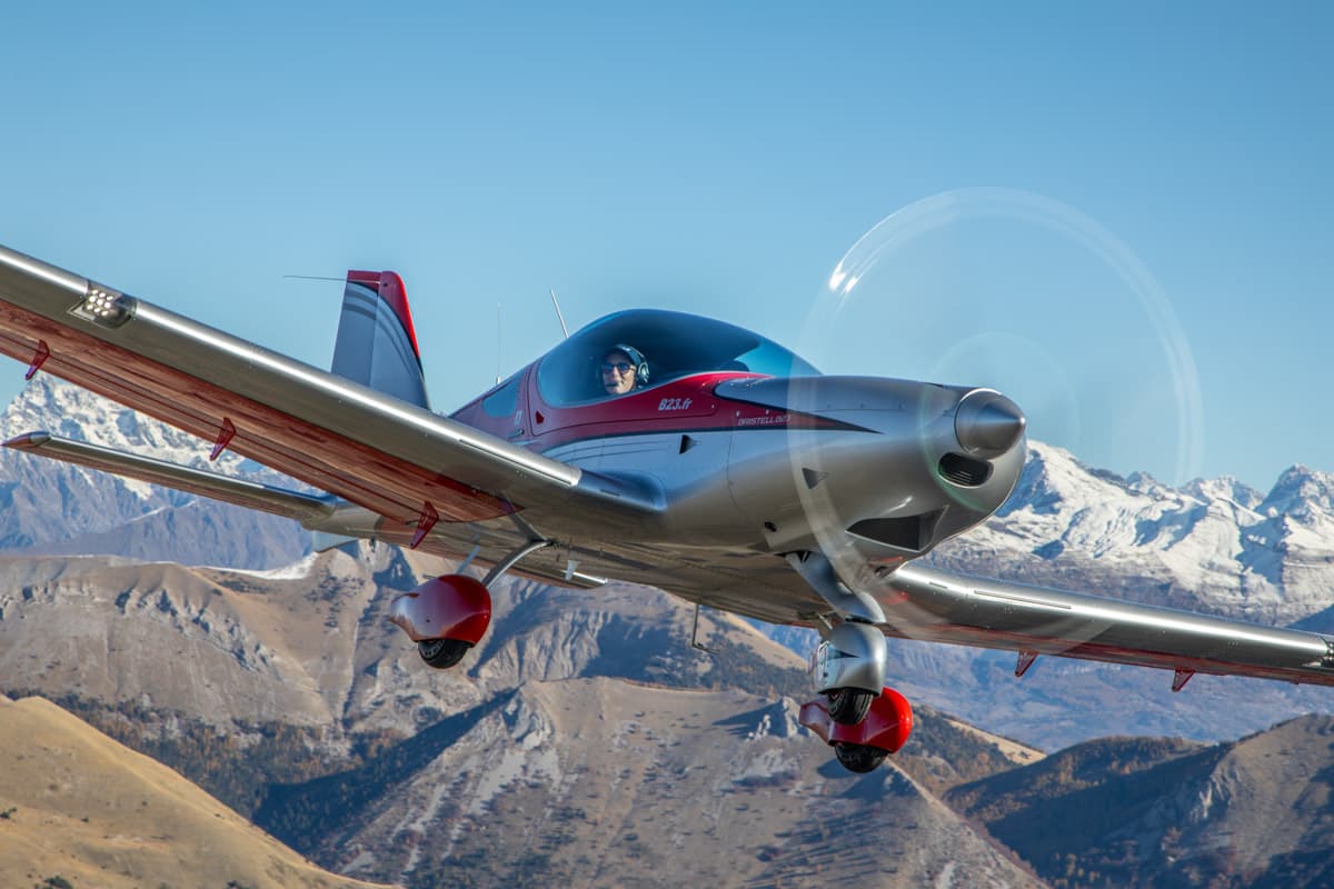 Bristell B23 Mosaic low pass with the sun behind the mountains